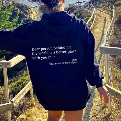 Black oversized hoodie with white letter print back design for casual daily wear.