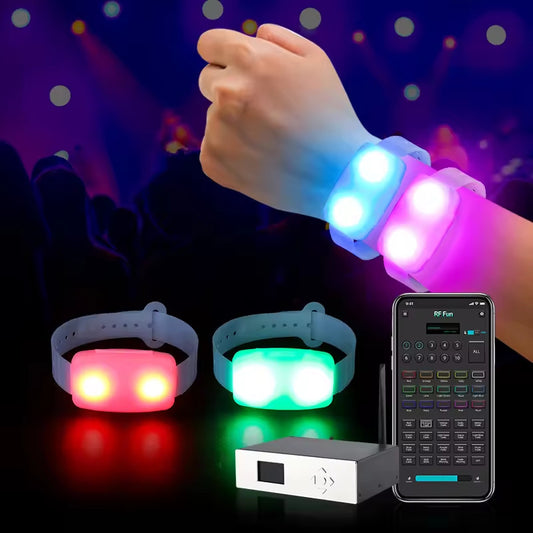 LED wristband glowing on wrist at concert