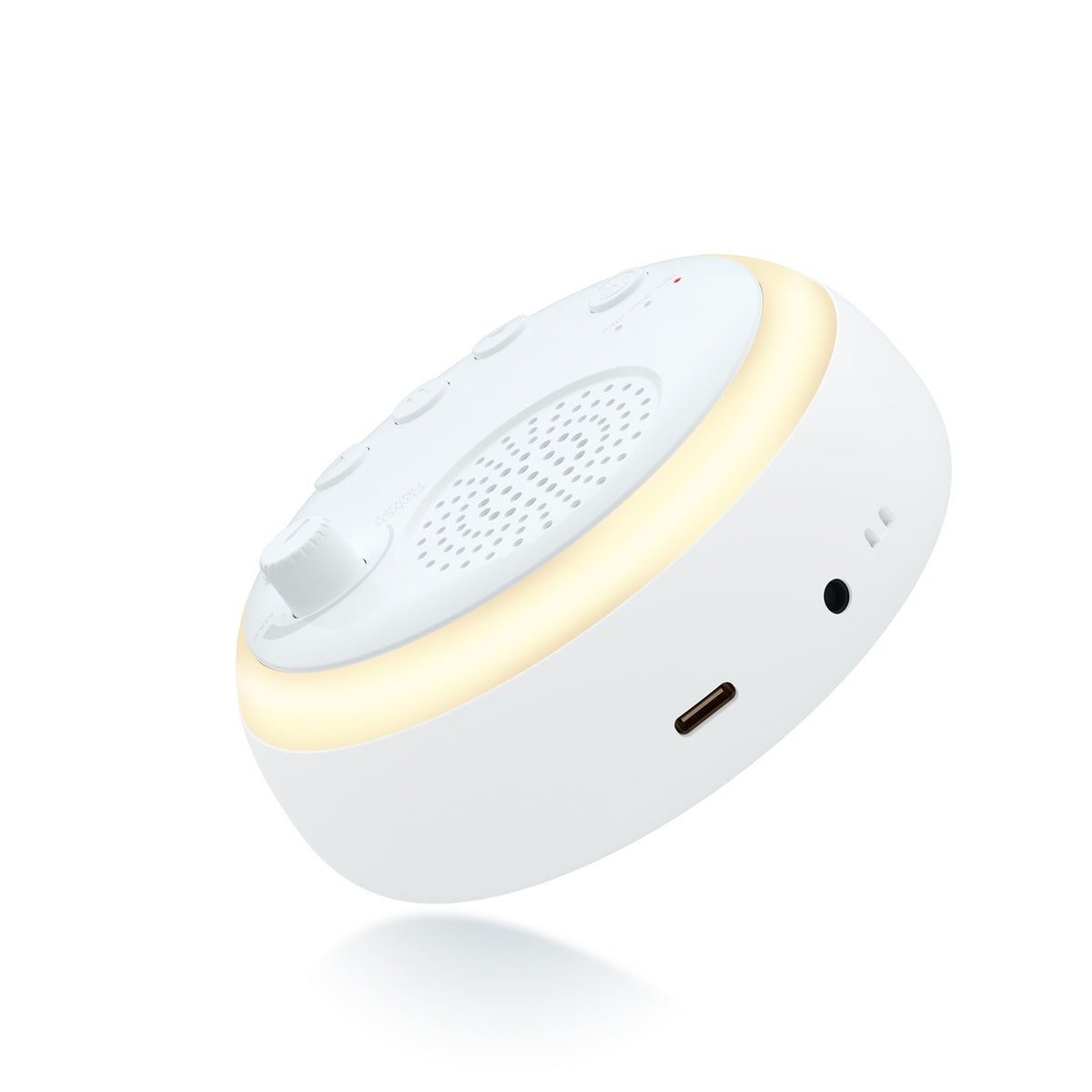 Round white sound machine with glowing light ring, speaker grille, and side charging port