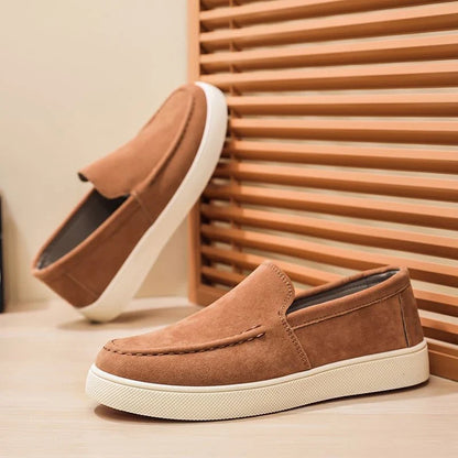 Suede loafers front view showing slip-on cut
