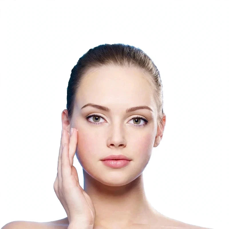 Close-up of a woman touching her cheek against a white background.