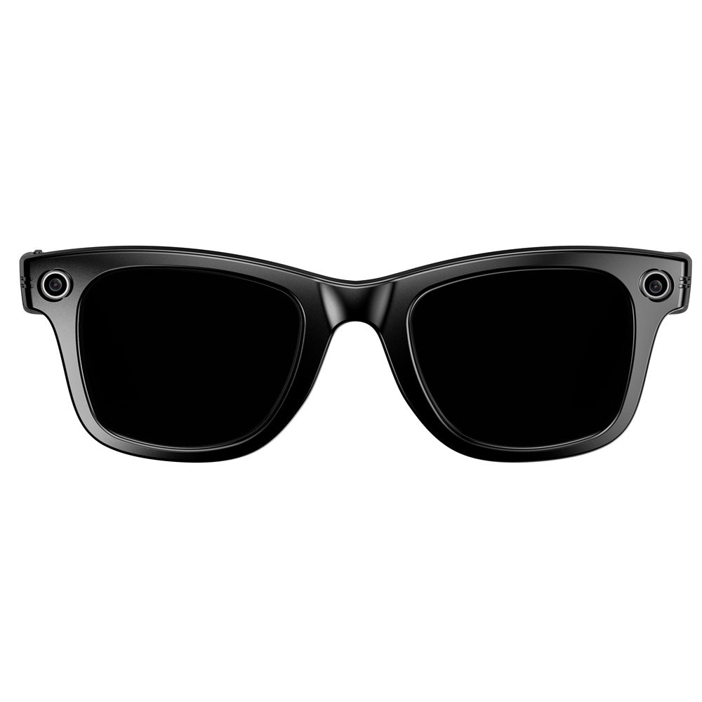 Black rectangular plastic smart wearable glasses with integrated side cameras for travel and everyday use.