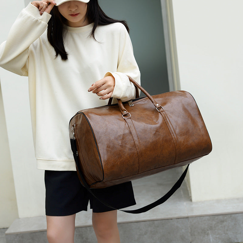 Polyurethane Leather Gym Bag with Soft Touch Finish and Structured Silhouette for Workouts and Travel