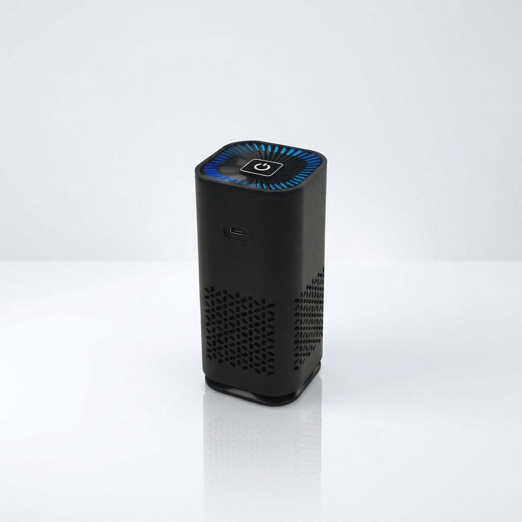 Tall black portable air purifier with a blue lit top control panel and perforated ventilation sides.