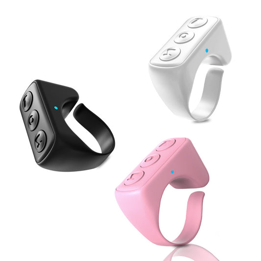 Bluetooth camera remote rings in black, white, and pink for phone selfies and videos