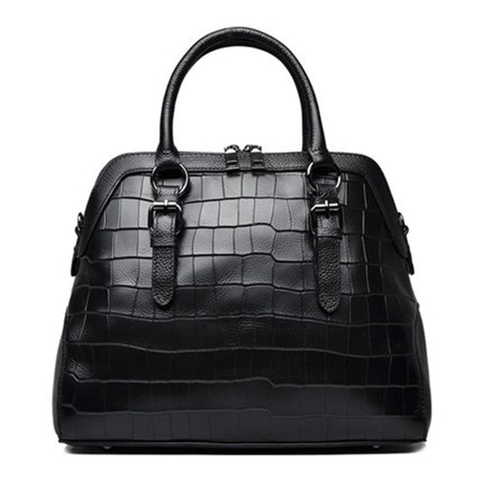 Black crocodile texture handbag with double straps and buckle details on white