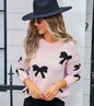 Warm Pullover with Jacquard Knit Bow Detail for Women with Draped Fit