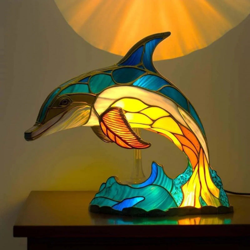 Home decor animal sculpture lamp featuring a glowing stained glass dolphin on waves bedside night light
