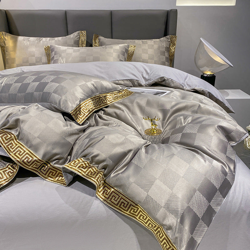 Grey and gold checkered bed sheet set with quilt cover and pillows