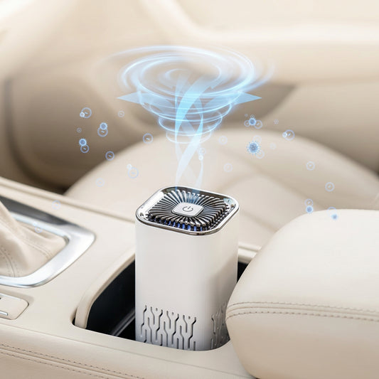 Compact white car air purifier in a cup holder with printed airflow and particle removal effects.