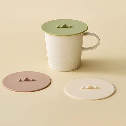 Silicone suction cup lid for mugs and bowls with mountain handle