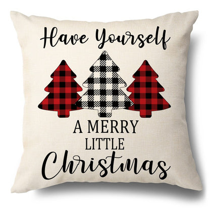 Beige pillow cover with buffalo plaid Christmas trees and Have Yourself A Merry Little Christmas text.
