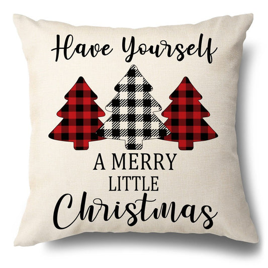 Beige pillow cover with buffalo plaid Christmas trees and Have Yourself A Merry Little Christmas text.