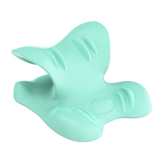 Mint green contoured neck stretcher pillow with textured surface and raised support ridges.