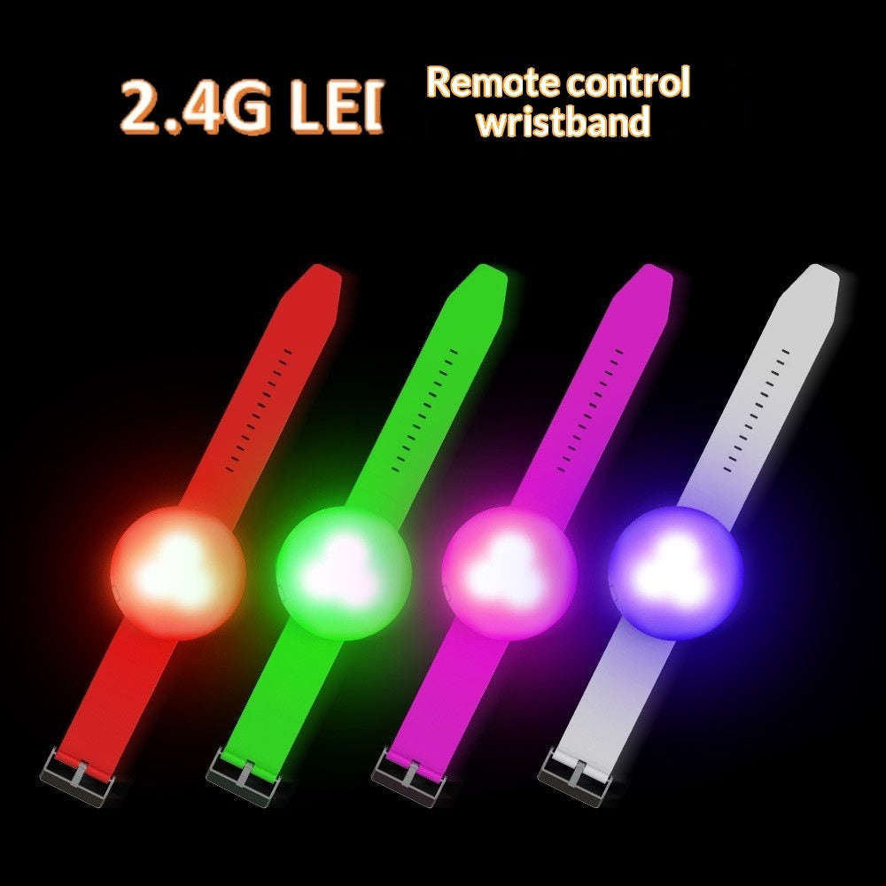 Four LED concert wristbands in red, green, pink, and white glowing on a black background with promotional text.