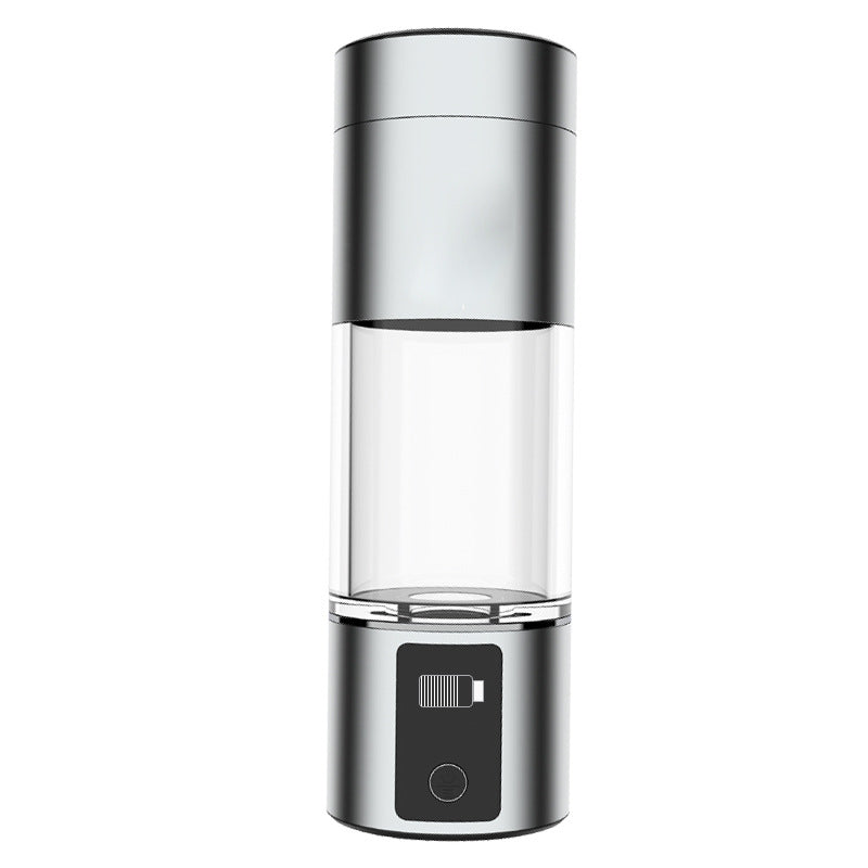 Silver hydrogen water bottle with clear central chamber and digital display on the base.