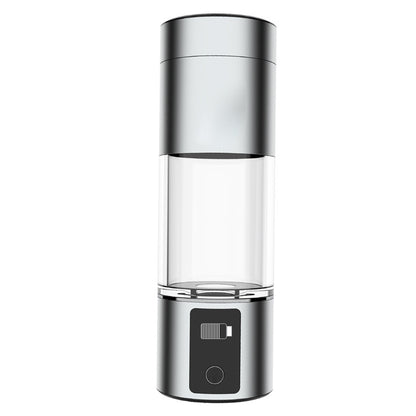 Silver hydrogen water bottle with clear central chamber and digital display on the base.