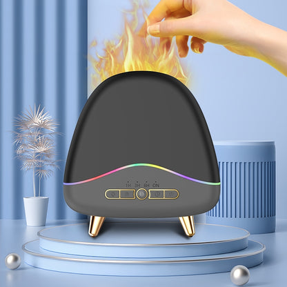 Black flame aroma diffuser on a blue platform with a hand hovering over the simulated orange flame effect.