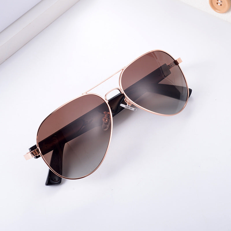Rose gold metal frame aviator polarized smart wearables for real-time AI translation during travel and outdoor use.