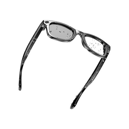 Black waterproof smart wearables with camera lens, water droplets on lenses for travel and daily use.