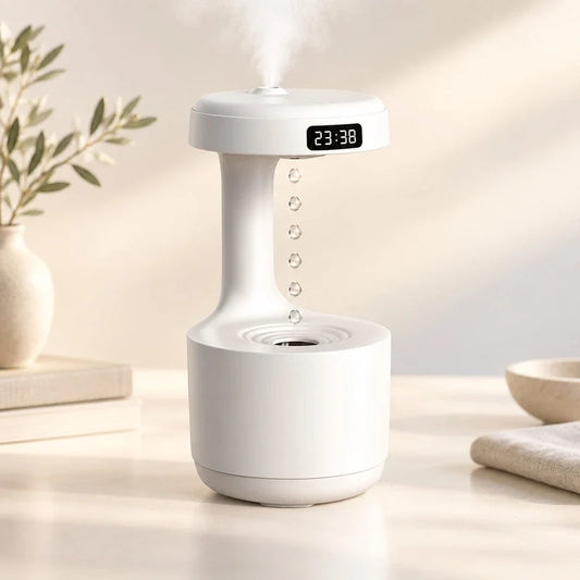 White ultrasonic humidifier with digital clock and floating water droplets.