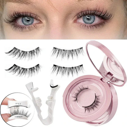 Magnetic eyelashes kit with strips, applicator tool, and a pink mirrored storage case