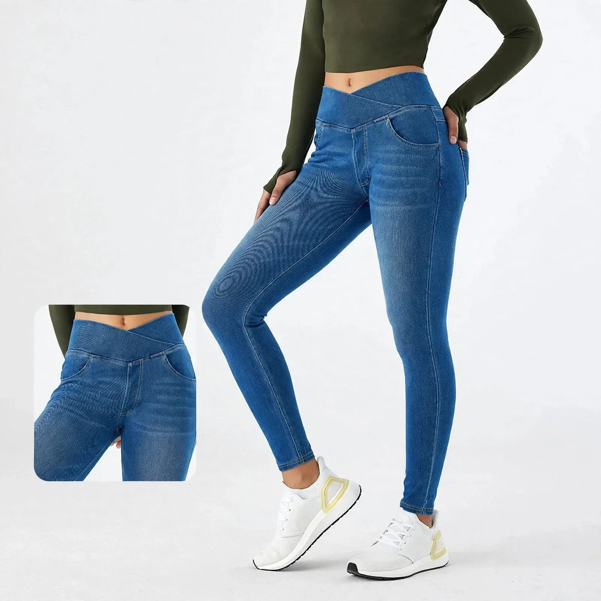 Woman wearing blue skinny yoga jeans with a cross waistband and white sneakers.