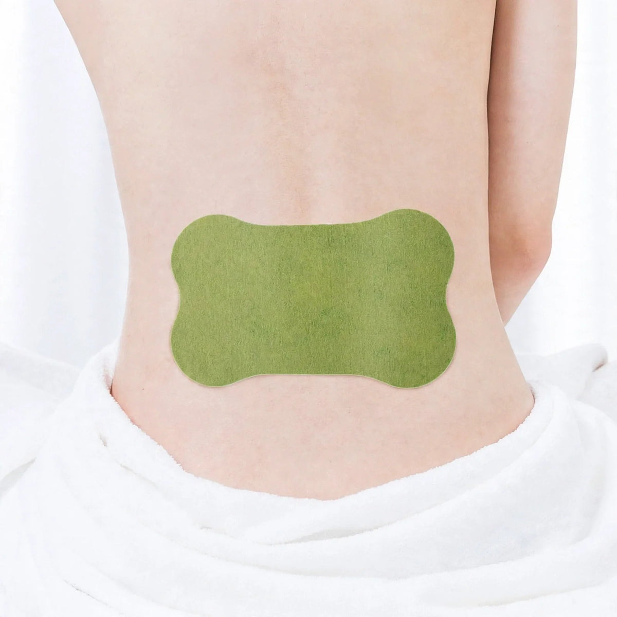 Green lumbar patch applied to lower back with overlaid text and feature badges.
