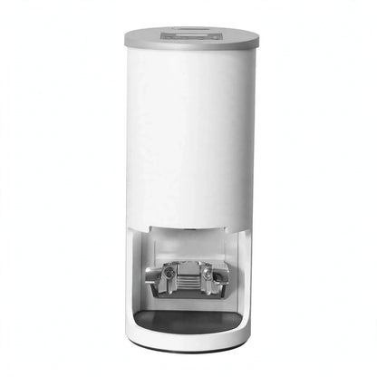 White automatic electric espresso tamper with digital display top and metallic portafilter slot.