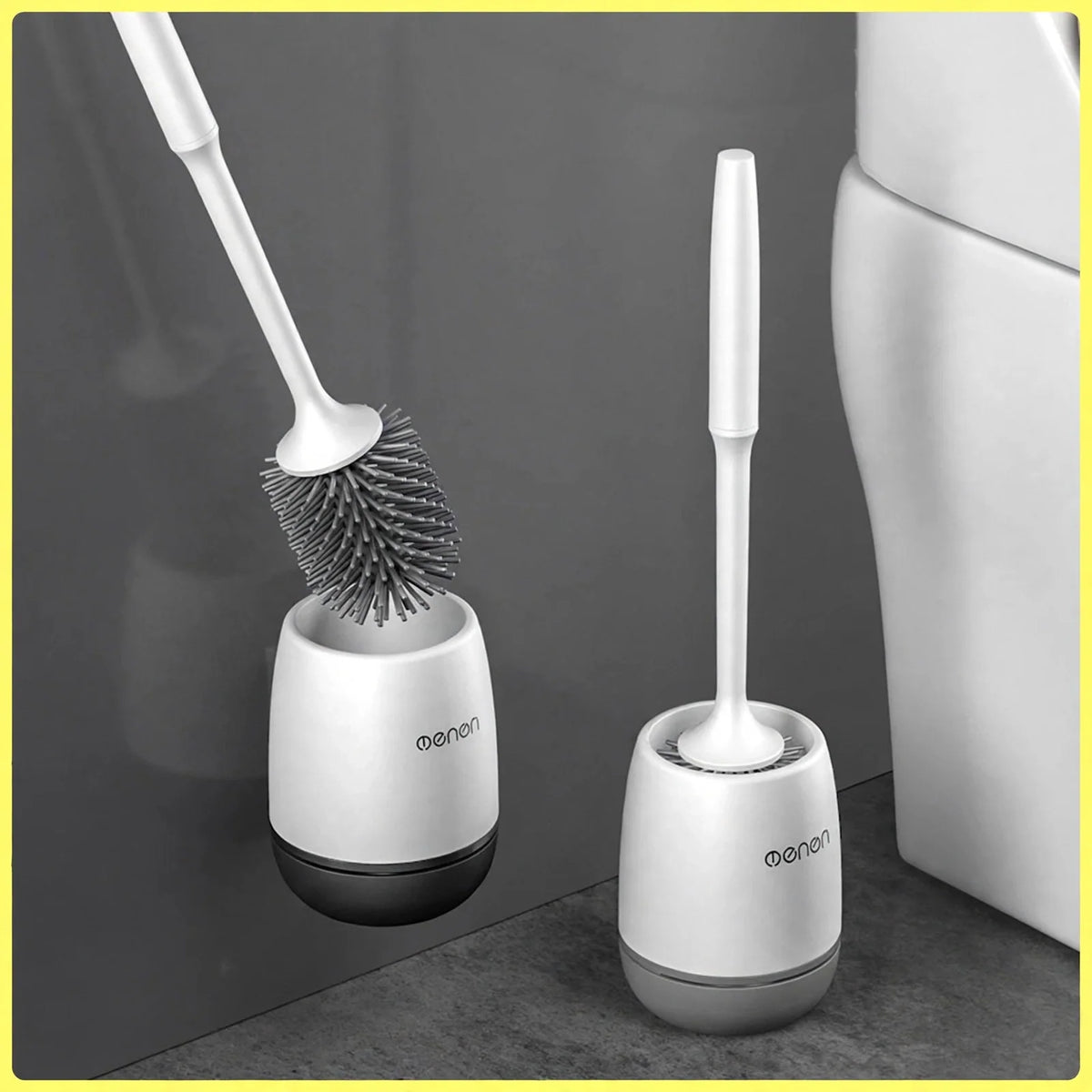 White silicone toilet brush with flexible bristles held inside a matching white and dark grey holder.