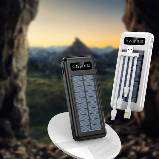Black and white solar power banks with integrated charging cables and digital battery level displays.