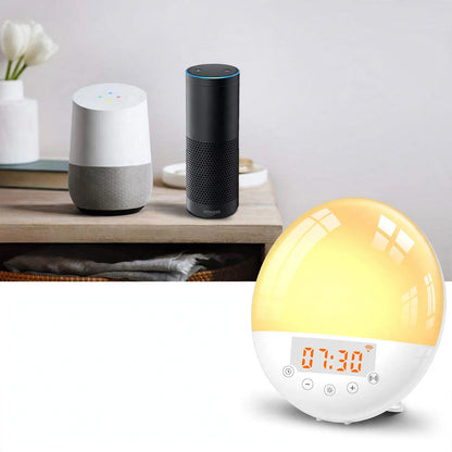 Round white sunrise alarm clock glowing yellow with digital display showing 07:30.