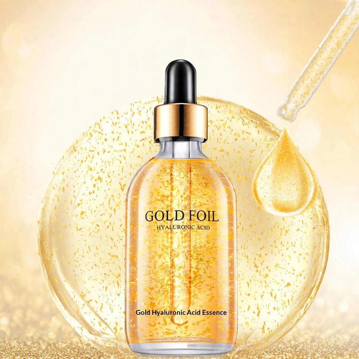 Gold foil hyaluronic acid facial serum bottle with dropper and droplet against a golden background.