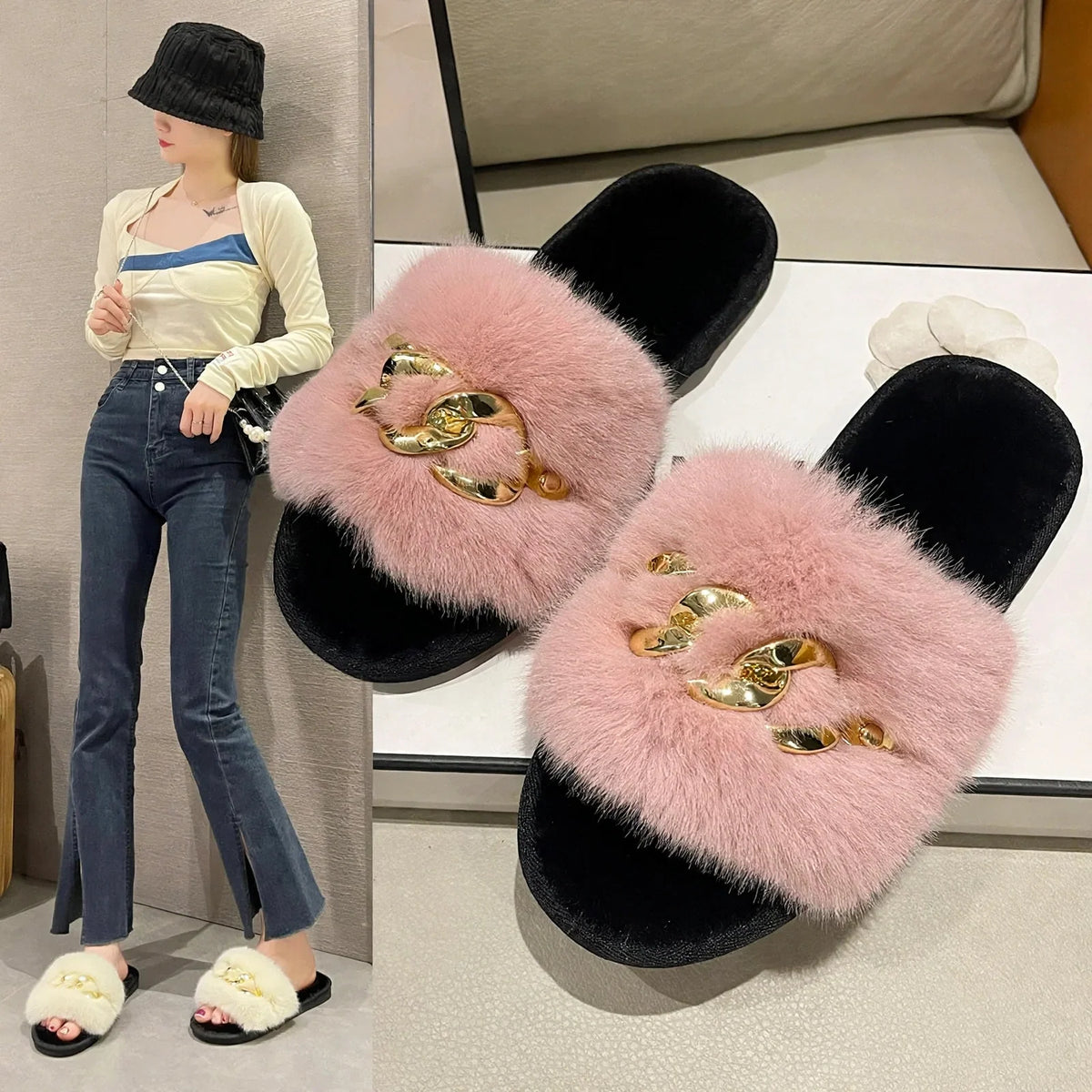 Pink fuzzy mule slippers with black footbeds and chunky gold-tone chain hardware.