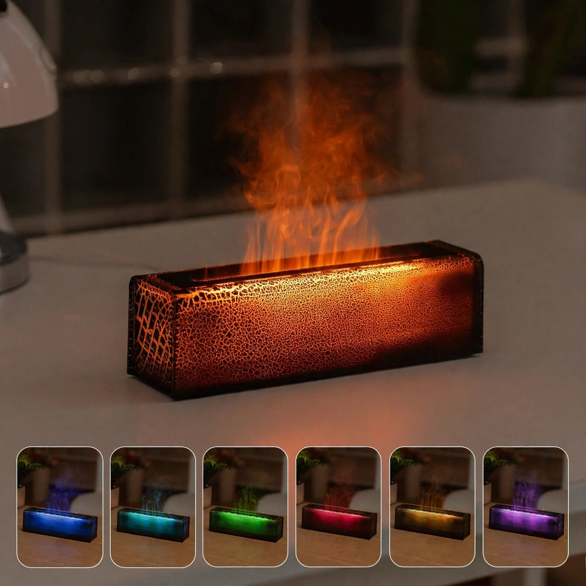 Rectangular aroma humidifier with textured cracked design glowing with orange flame effect mist.