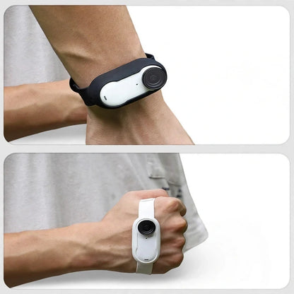 Small action camera worn on the wrist with a black band in one view and a white band in another view.