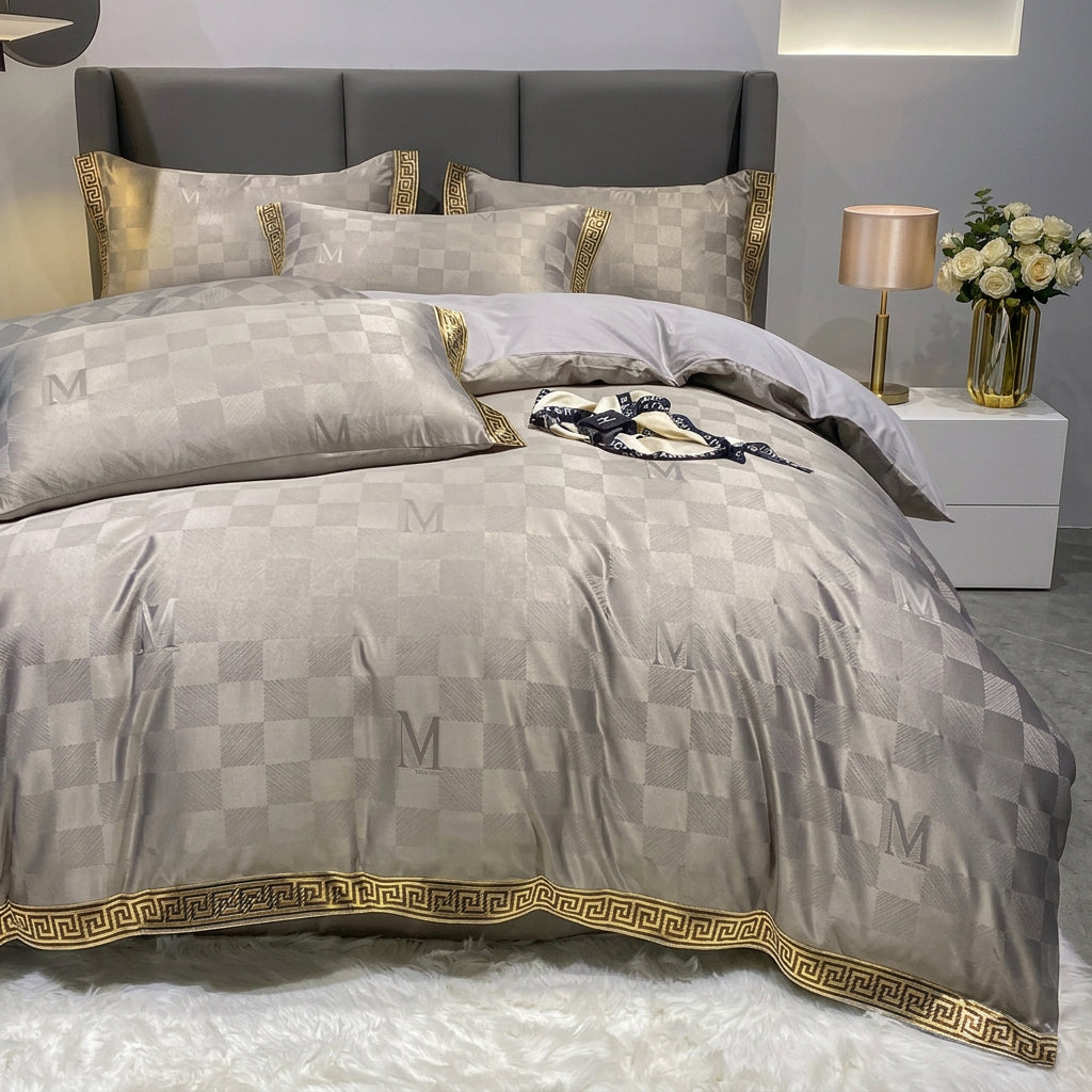 Grey checkered bed sheet set with a quilt cover, matching pillows, and a gold geometric key border.