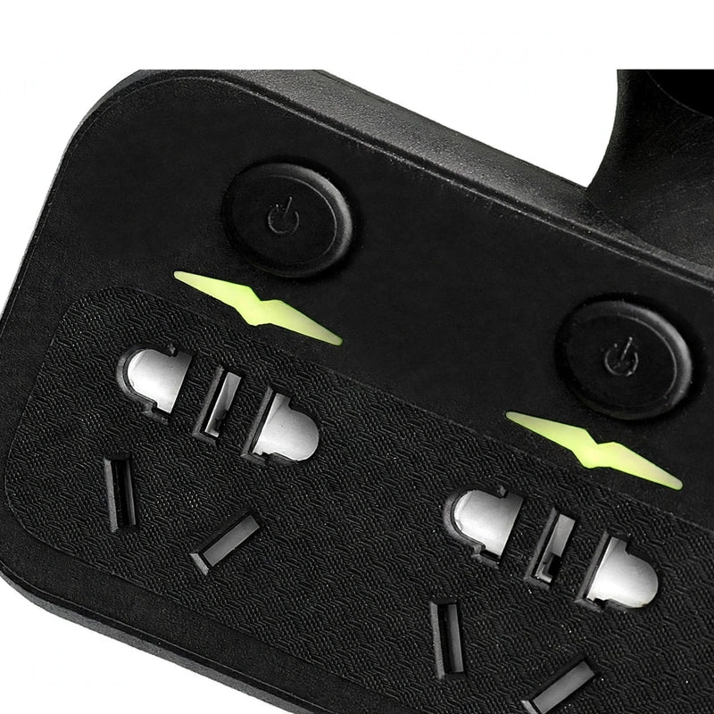 Close-up of a black power strip showing two grounded AC outlets, power buttons, and glowing indicator lights.