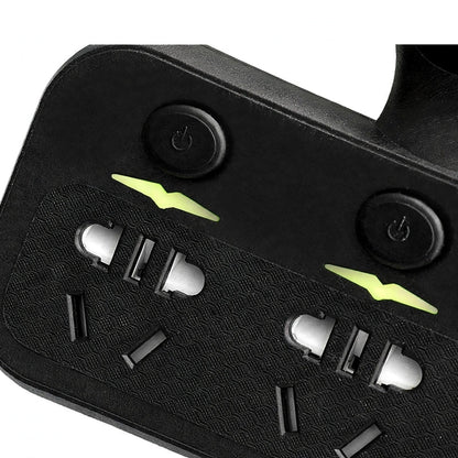 Close-up of a black power strip showing two grounded AC outlets, power buttons, and glowing indicator lights.