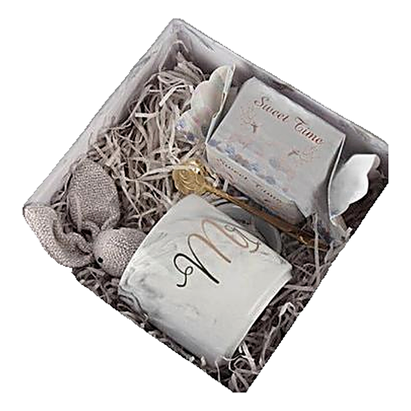 Gift set relaxation bath set featuring a ceramic mug, spoon, stuffed rabbit toy, and soap box