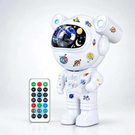 White astronaut star projector with colorful space stickers, faceted visor, and a matching remote control.