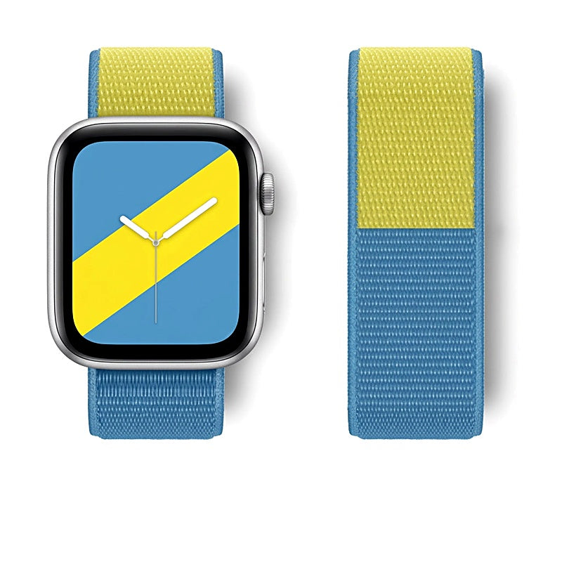 Yellow and blue woven nylon watch band on a silver smartwatch next to a detached matching band.