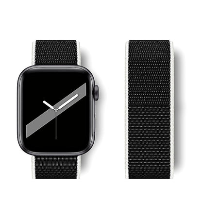 Black woven nylon watch band with white borders attached to a smartwatch, beside an unattached strap
