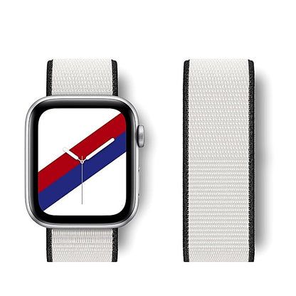 White nylon watch band attached to a smartwatch alongside an unattached matching band.