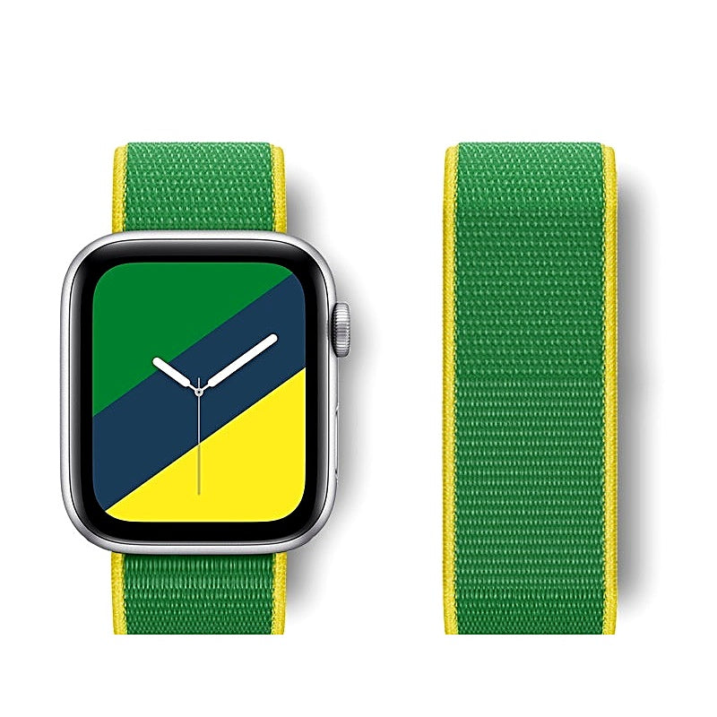 Green nylon watch band with yellow edges attached to a smartwatch displaying a green, blue, and yellow watch face.