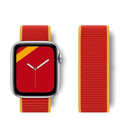Red woven nylon watch band with yellow edges attached to a smartwatch, shown alongside a detached matching band strip.