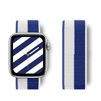 Blue and white striped nylon watch band attached to a smartwatch, with a separate strap section shown beside it.