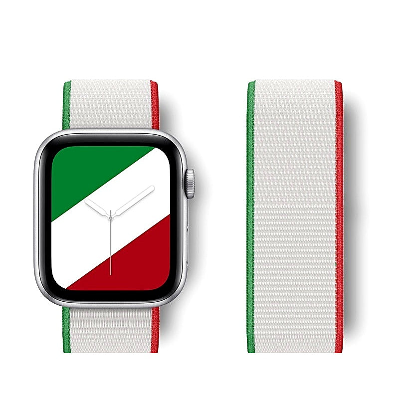 White nylon watch band with green and red border stripes attached to a smartwatch displaying a diagonal tricolor watch face.