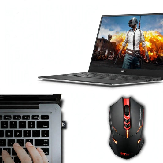 Black wireless gaming mouse with red accents, shown alongside a laptop and a USB receiver plugged into a keyboard.