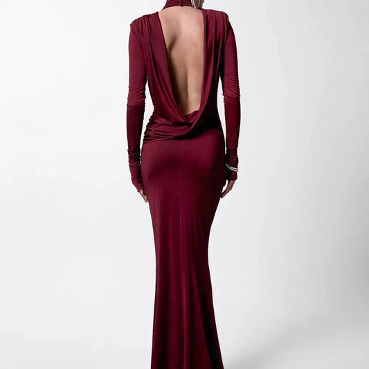 Burgundy long-sleeve maxi dress with a cowl backless design and high neck.